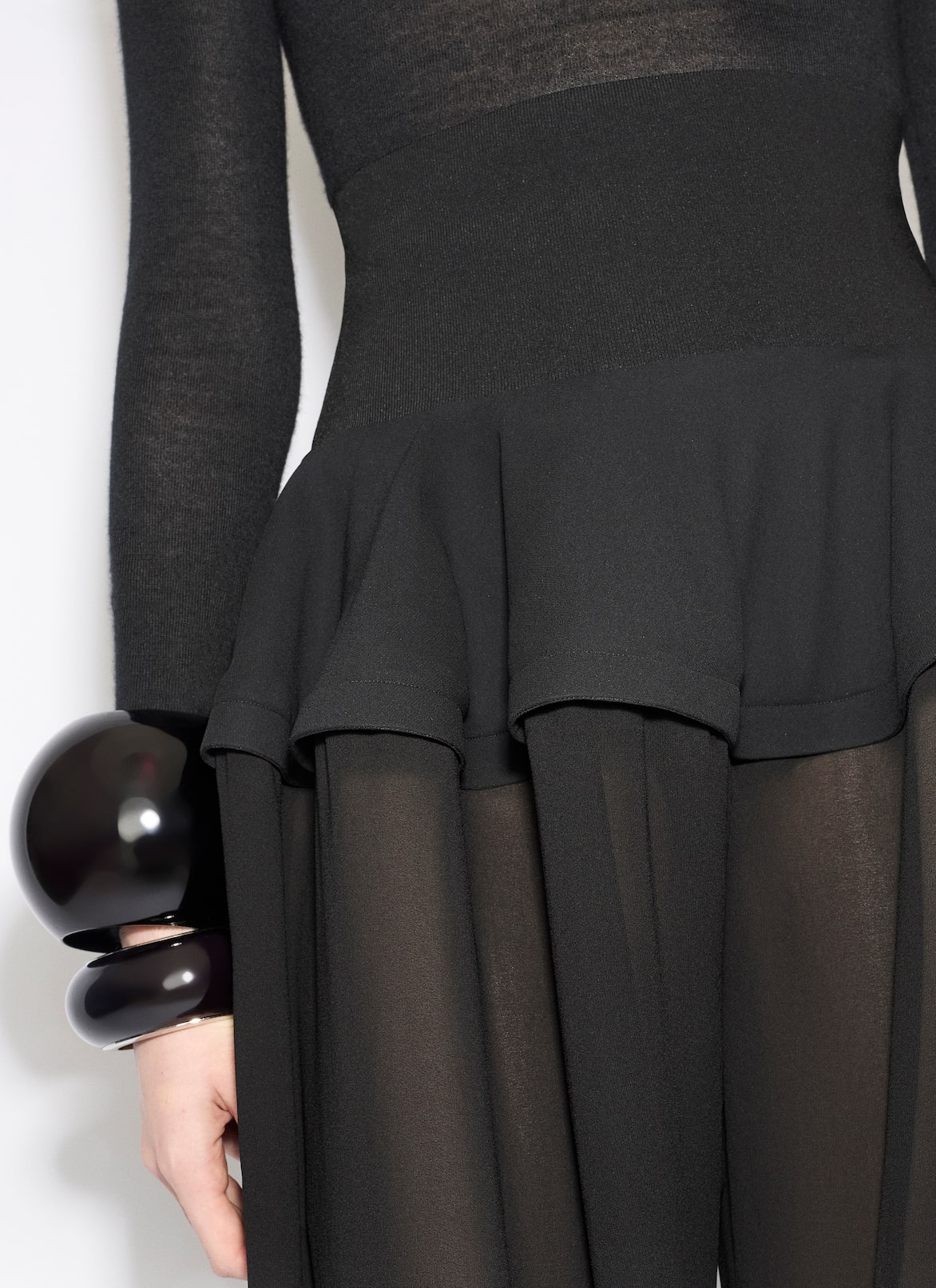 GEORGETTE PEPLUM PANTS ALAÏA BLACK GEORGETTE PEPLUM PANTS